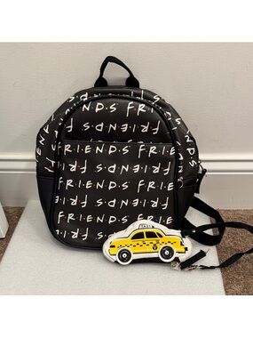 FRIENDS Black Mini Backpack with Yellow Taxi Charm